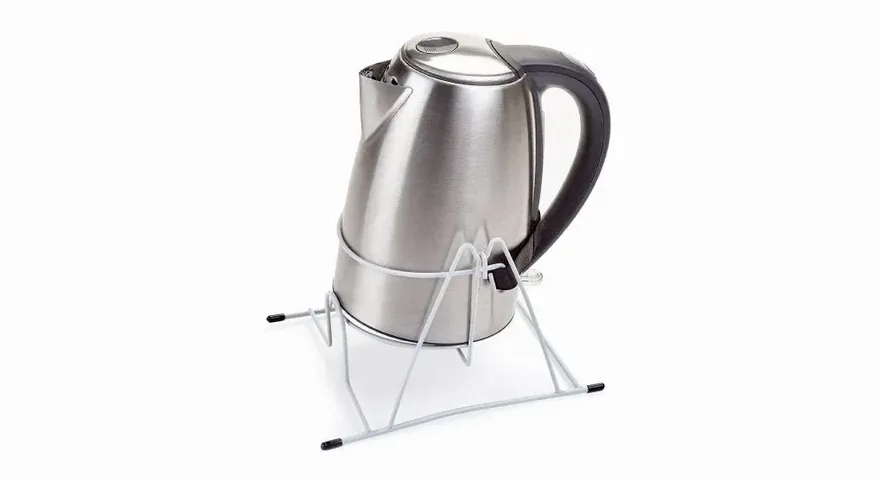 Kettle tipper cradle holding a stainless steel kettle for safer pouring